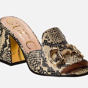 Gucci Black and Cream Mules with Gold Accent